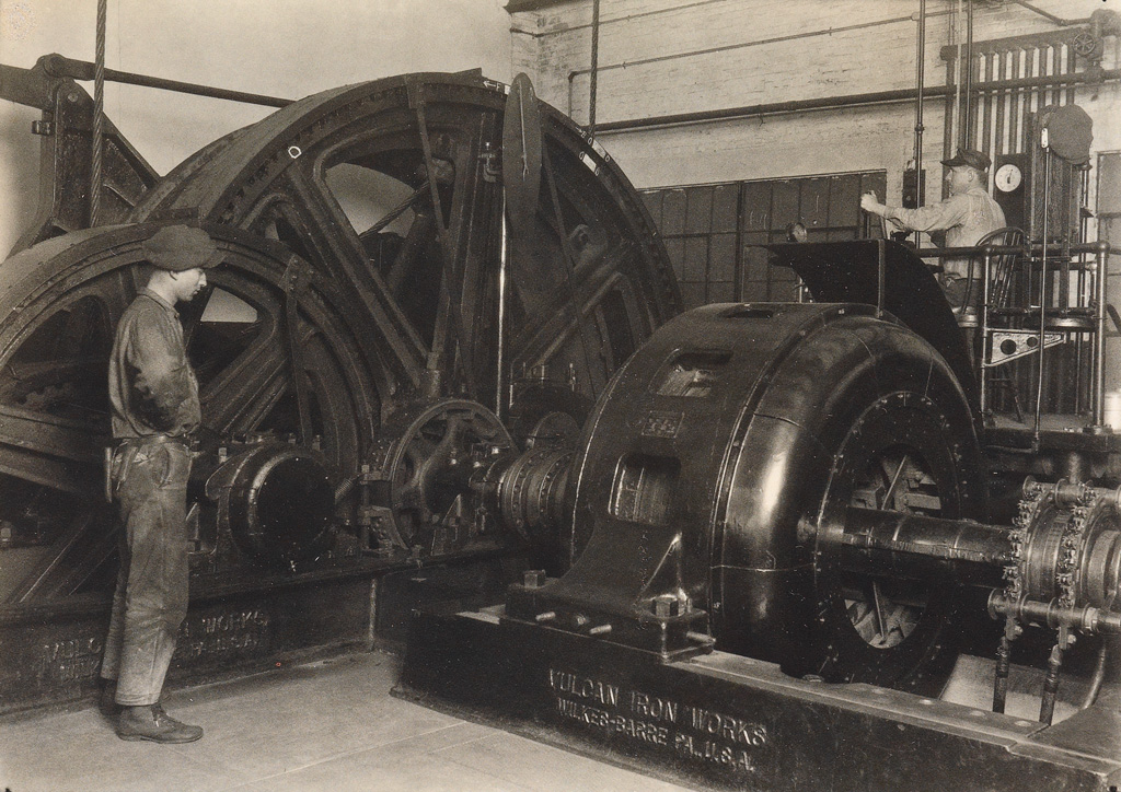 LEWIS W. HINE (1874-1940) Workers operating machinery manufactured by Vulcan Iron Works.